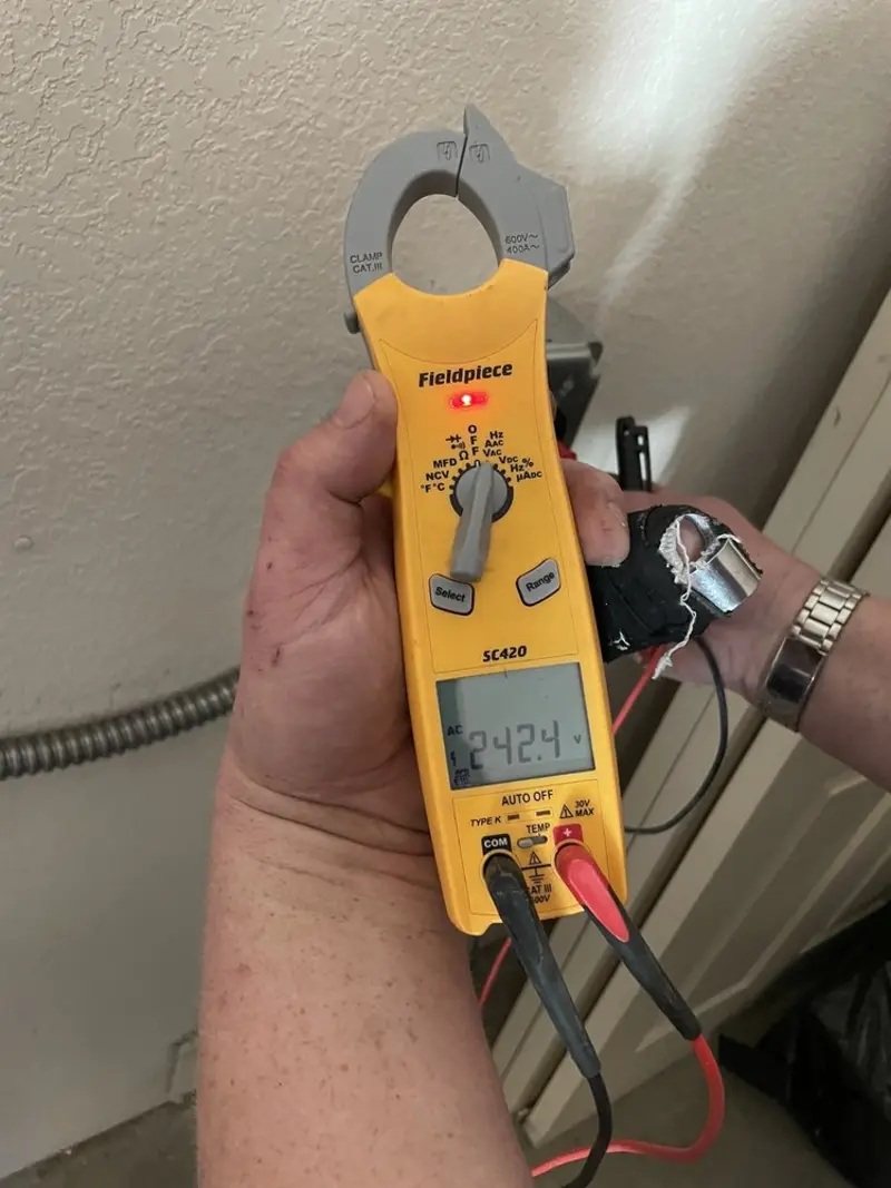 Voltage testing with clamp meter during Hot Tub / Pool Electrical Wiring in Greensboro